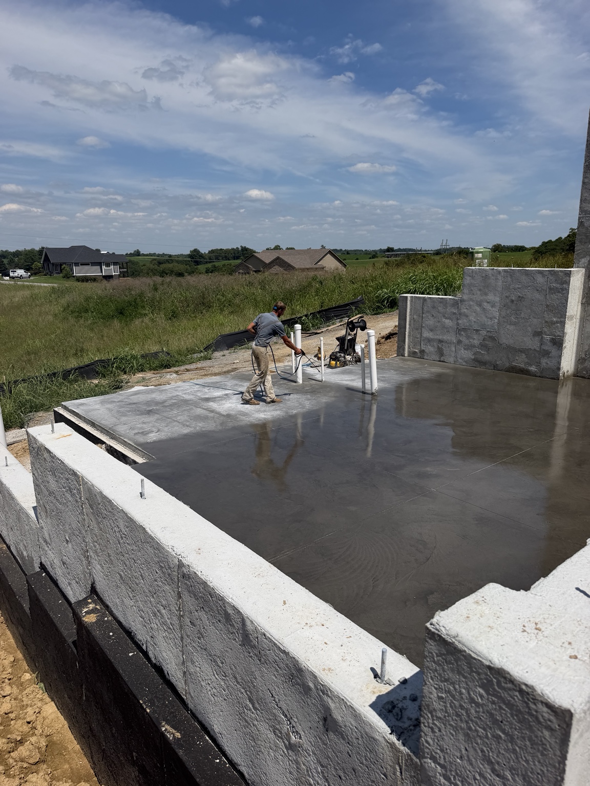 Concrete basement floor and foundation walls