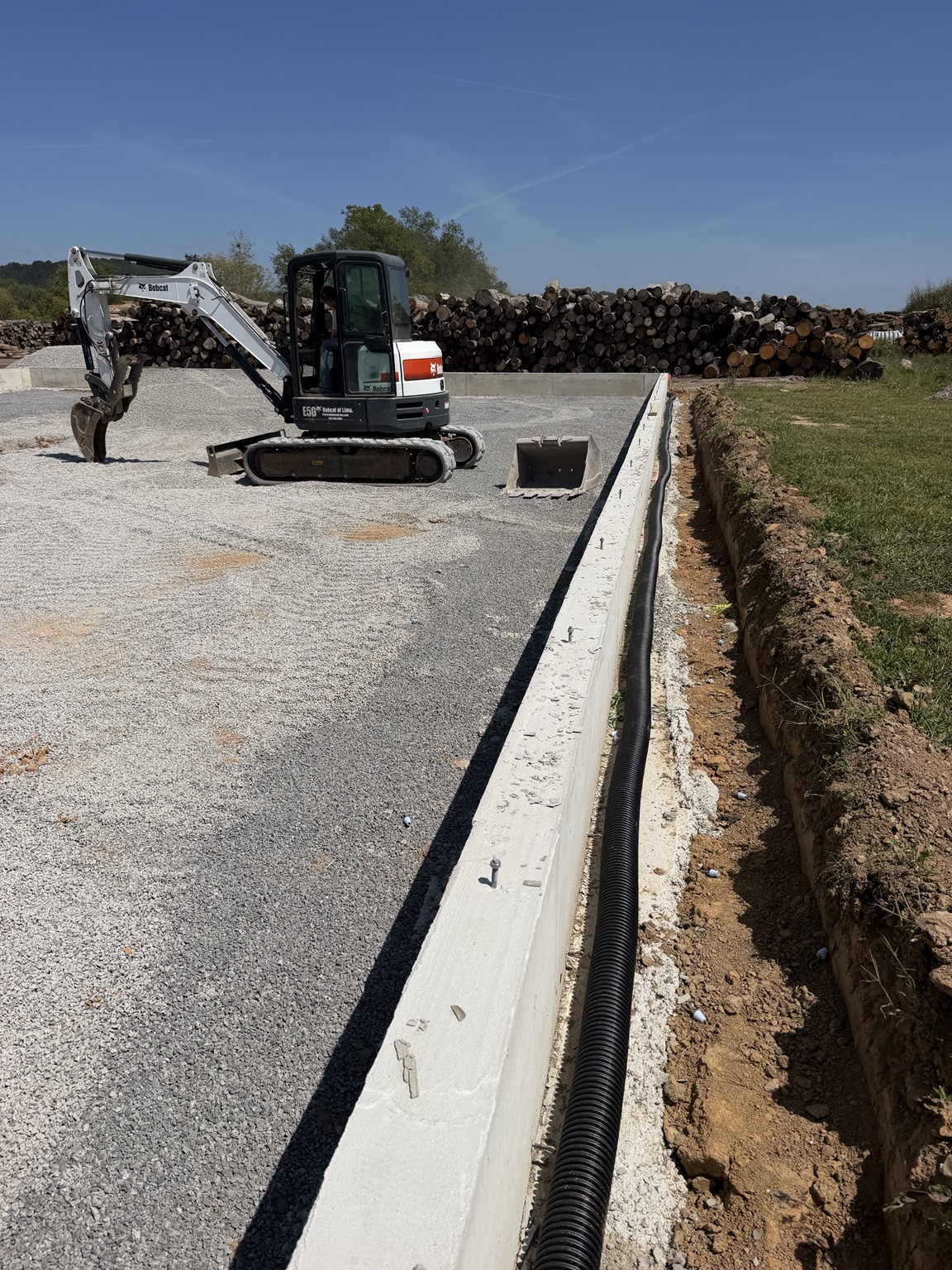 Foundation and site preparation with excavator