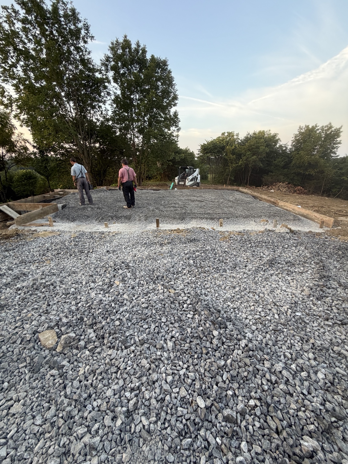Prepared gravel base before a concrete pour