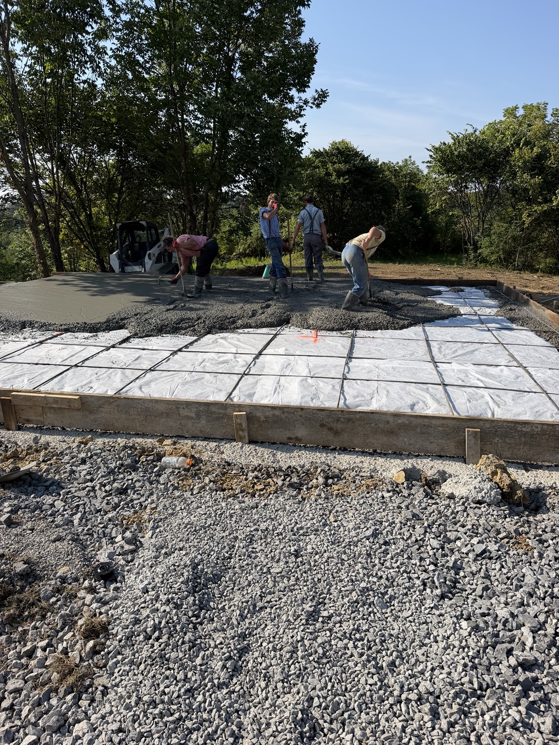 Stone Ledge Concrete crew pouring a slab